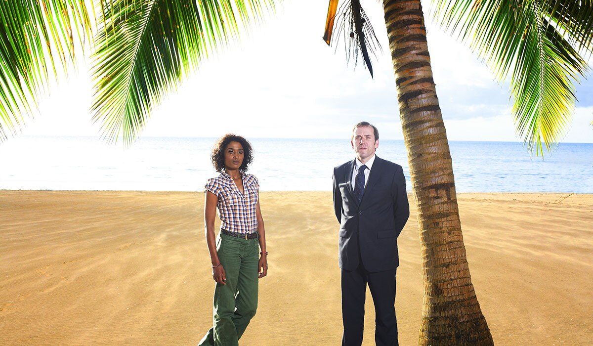 2 Death In Paradise characters at beach